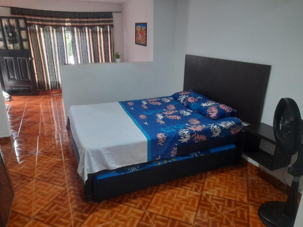 Postel nebo postele na pokoji v ubytování apartaestudios el jardin 2
