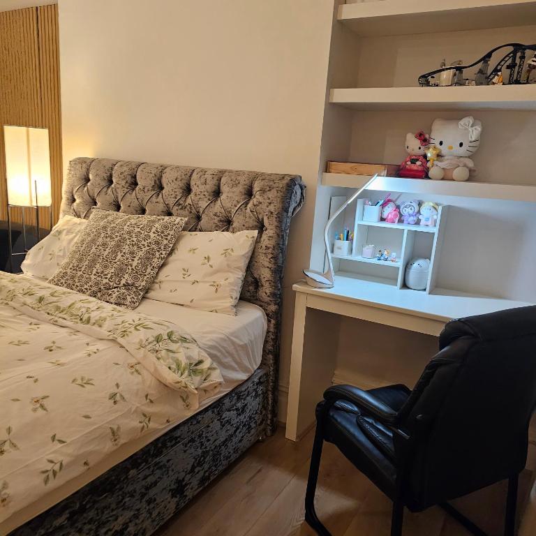 Postel nebo postele na pokoji v ubytování Hello Kitty