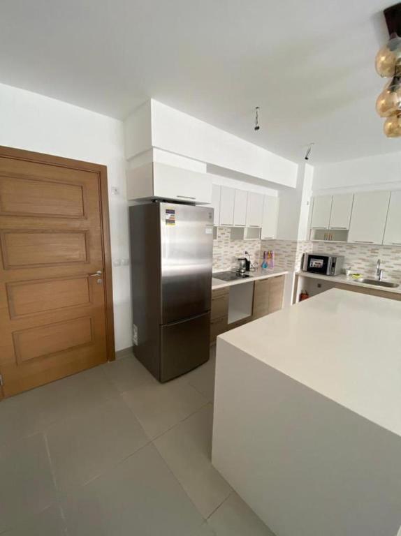Kuchyň nebo kuchyňský kout v ubytování Marassi hotel Apartment