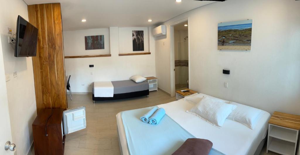 TV a/nebo společenská místnost v ubytování Hotel Casa Cytia