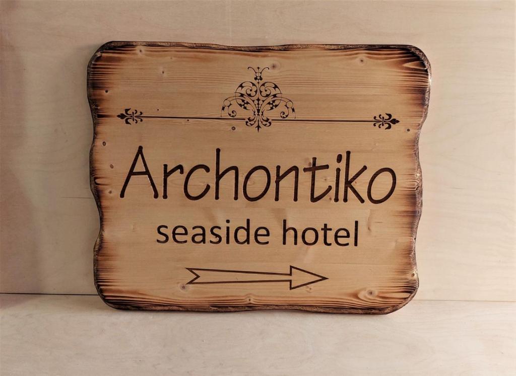 Um certificado, prêmio, placa ou outro documento exibido em Archontiko Seaside Hotel