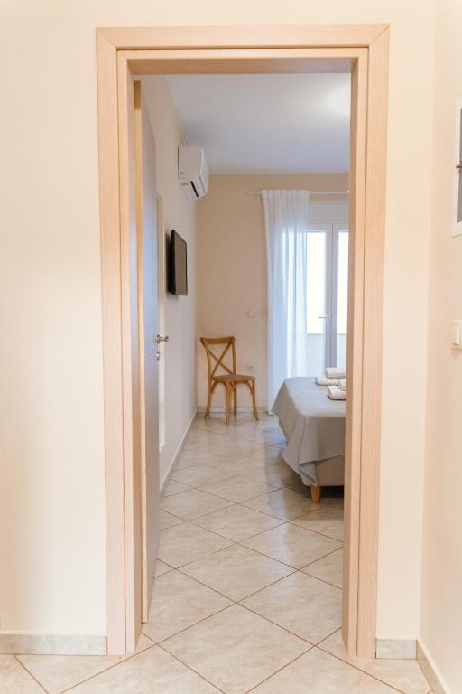 Telewizja i/lub zestaw kina domowego w obiekcie Venetiko rooms