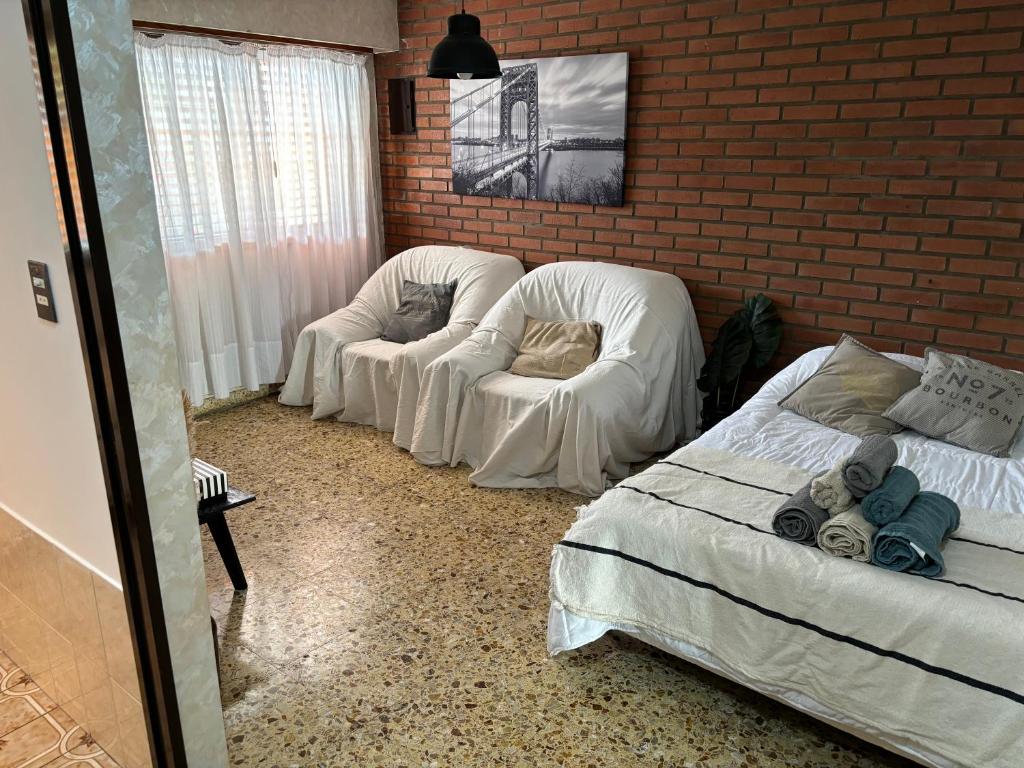 Ein Sitzbereich in der Unterkunft Casa Orejas - Departamentos en Tigre Centro