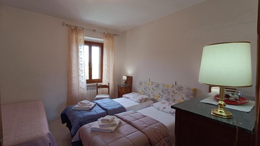 Postel nebo postele na pokoji v ubytování Il Fiordaliso