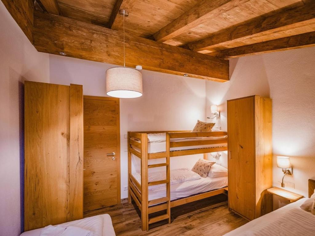 A bed or beds in a room at Lodge Elise
