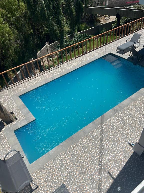 Πισίνα στο ή κοντά στο Villa Rodríguez-Peña