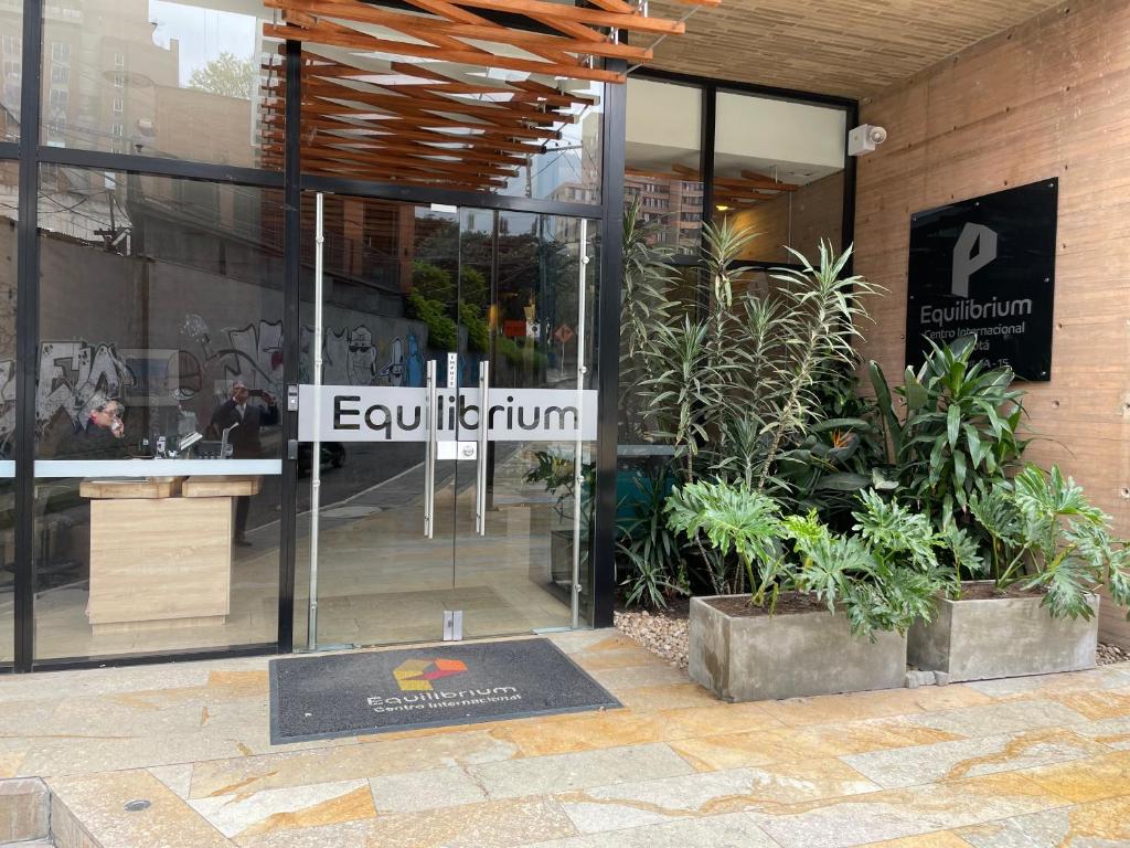 a store front with a sign that reads equilibrium at Loft Cool in Equilibrium in Bogotá