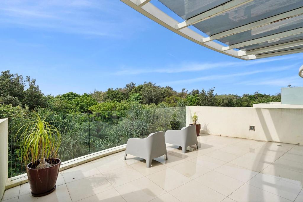Balkón nebo terasa v ubytování Pandanus Beach House - Direct Beach Access