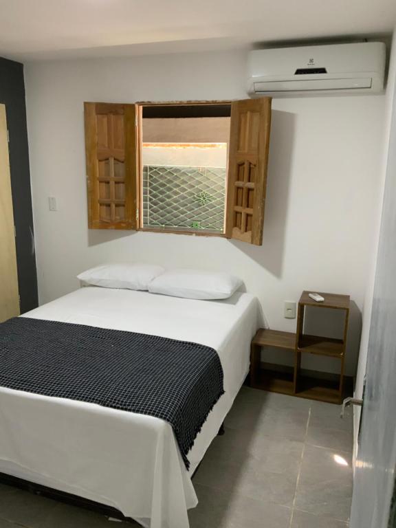 Ένα ή περισσότερα κρεβάτια σε δωμάτιο στο HOSTEL DO PORTO