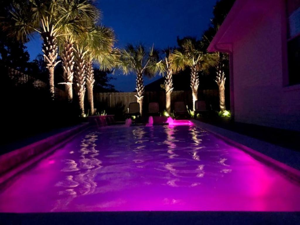 Beautiful Pet Friendly Home! Tropical Pool, Optional Golf Cart & Pool Heat, Minutes to Beach photo