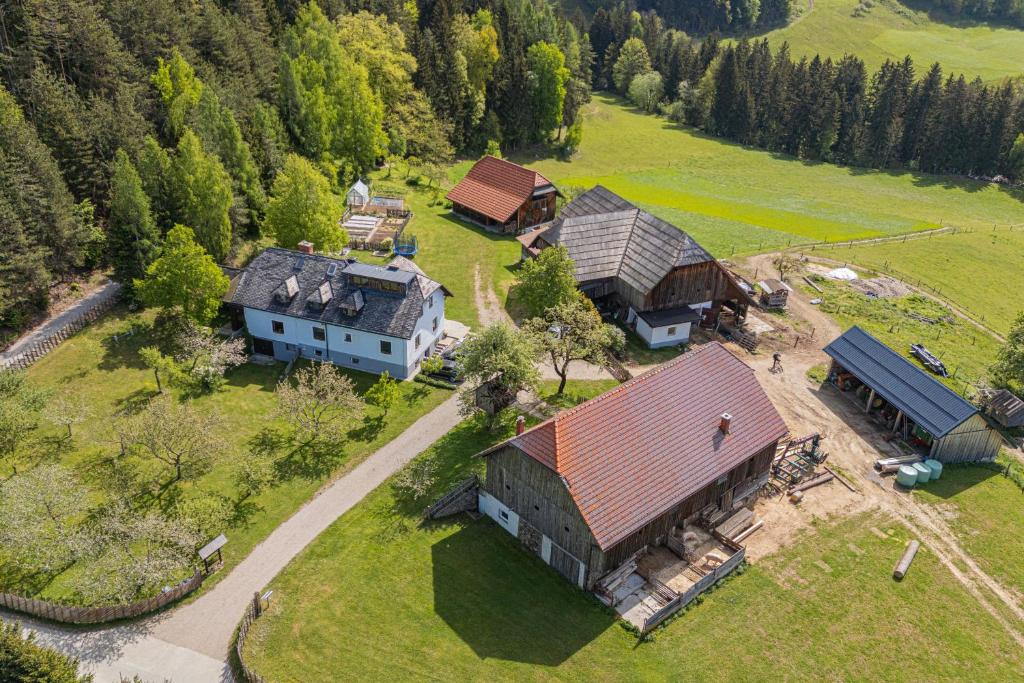 an aerial view of a house with a yard at Organic Homestead Mikl - Happy Rentals in Slovenj Gradec