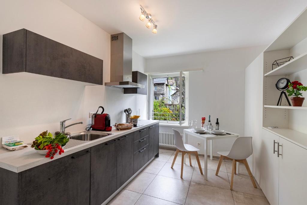 Kuchyň nebo kuchyňský kout v ubytování Residenza La Serenata