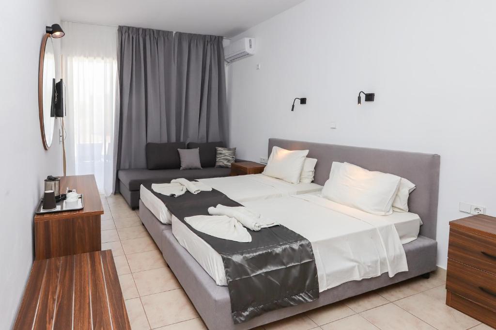 Postel nebo postele na pokoji v ubytování BELVITA Hotel
