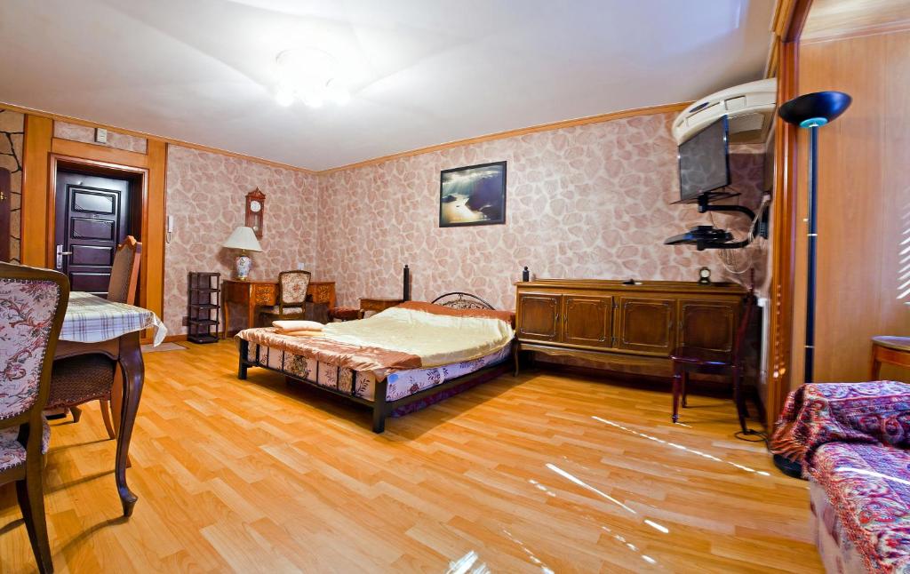 
Кровать или кровати в номере Lessor Apartments
