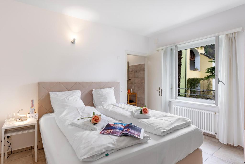 Postel nebo postele na pokoji v ubytování Residenza La Serenata