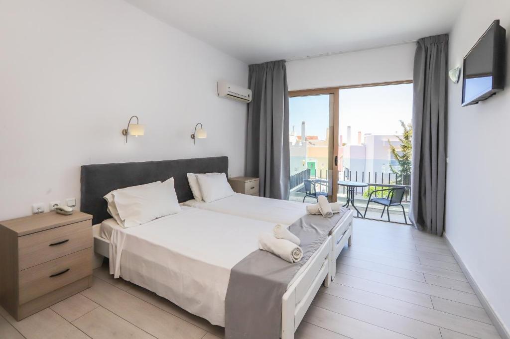 Postel nebo postele na pokoji v ubytování BELVITA Hotel