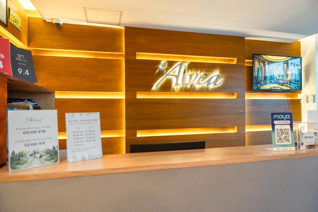 ALVEA HOTELに飾ってある許可証、賞状、看板またはその他の書類