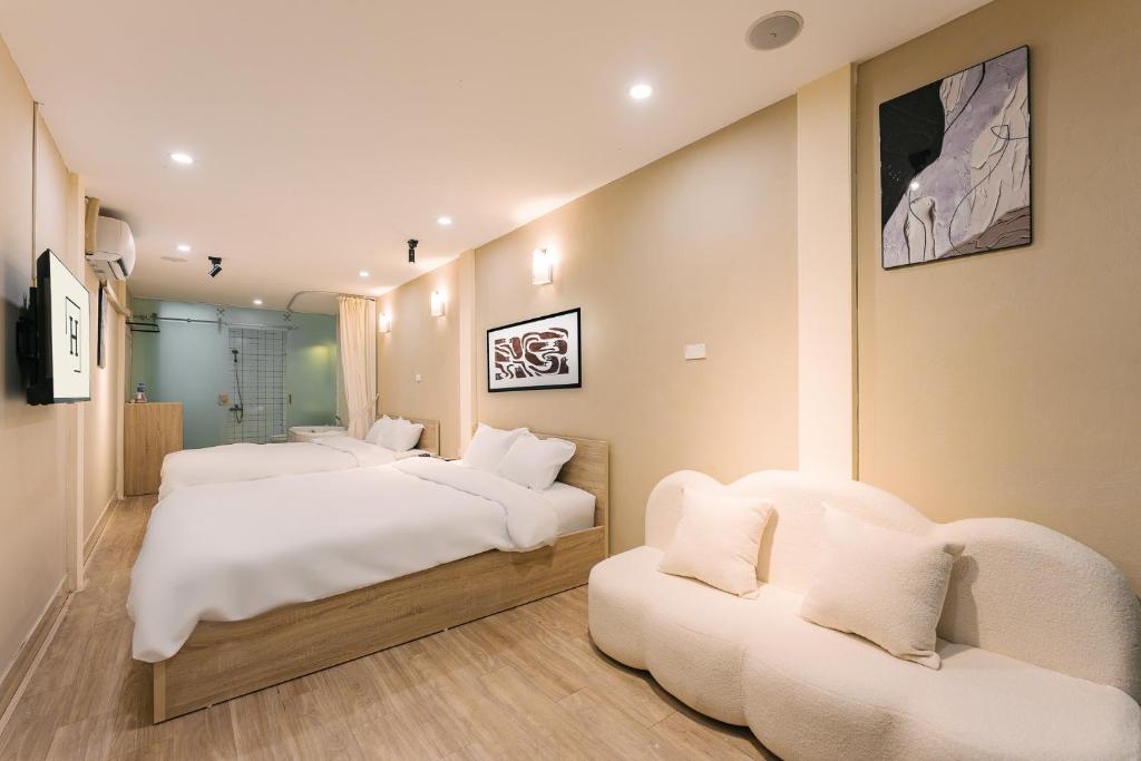 Postel nebo postele na pokoji v ubytování Hanoi-Oi Homestay Cau Go