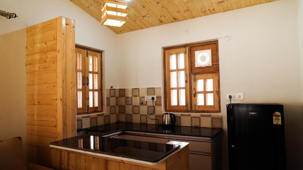 Kuchyň nebo kuchyňský kout v ubytování Saanjh Cottages