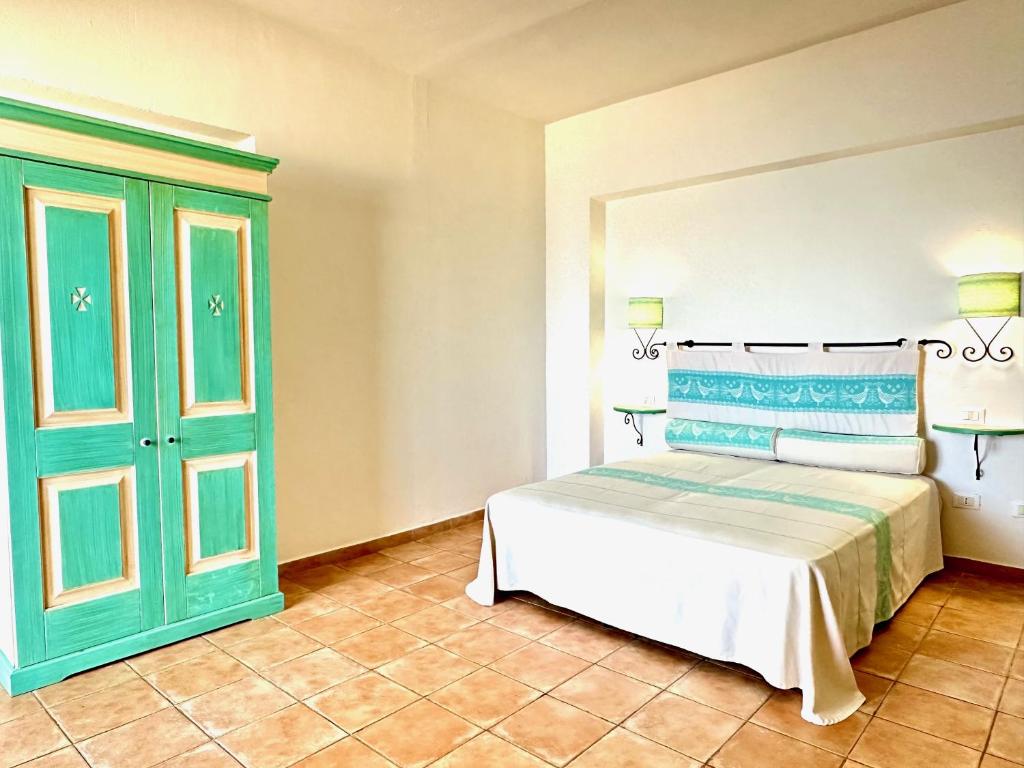 Postel nebo postele na pokoji v ubytování Acqua di Mare Hotel e Resort
