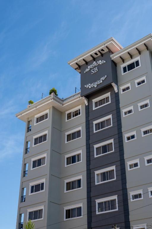 a building with a sign on top of it at Sta Barbara Residence Hotel in Cebu City
