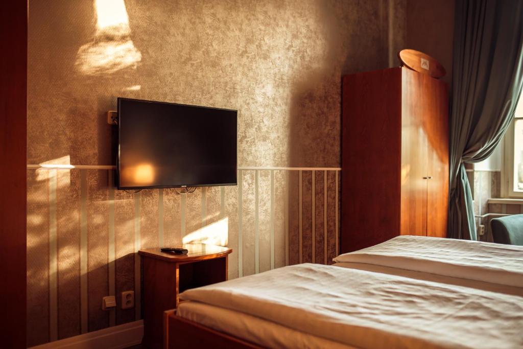 TV a/nebo společenská místnost v ubytování Hotel Kaštieľ Mojmírovce