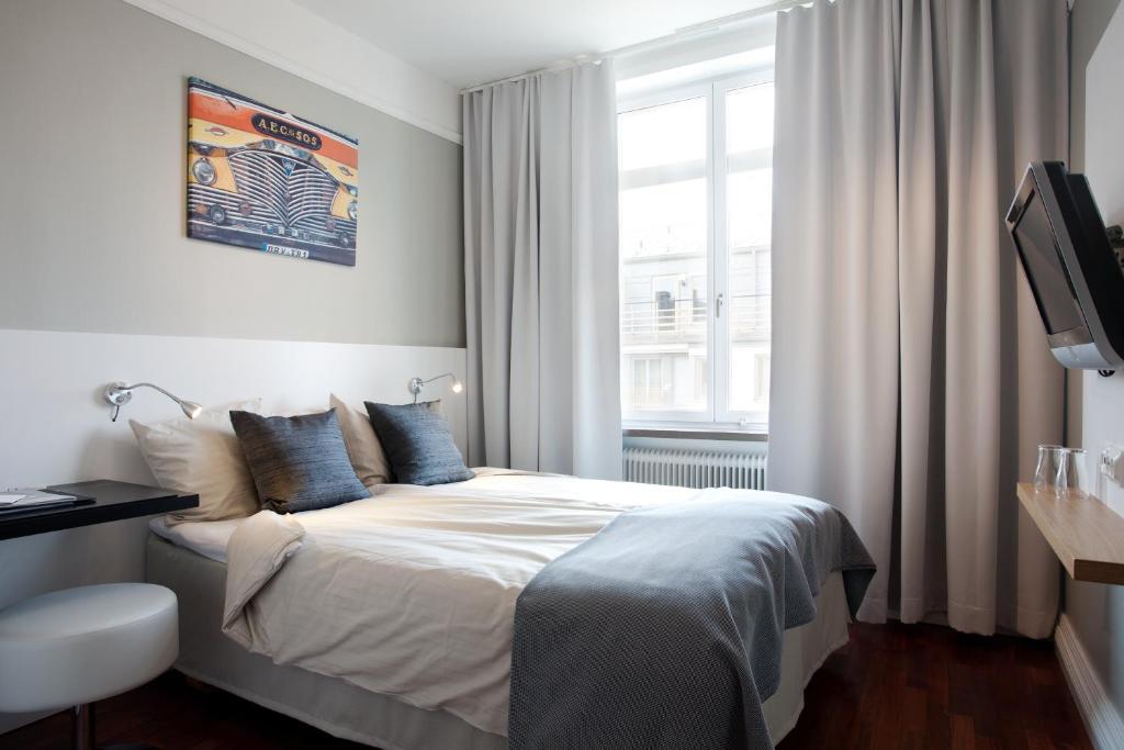 Postel nebo postele na pokoji v ubytování Hotel Örebro