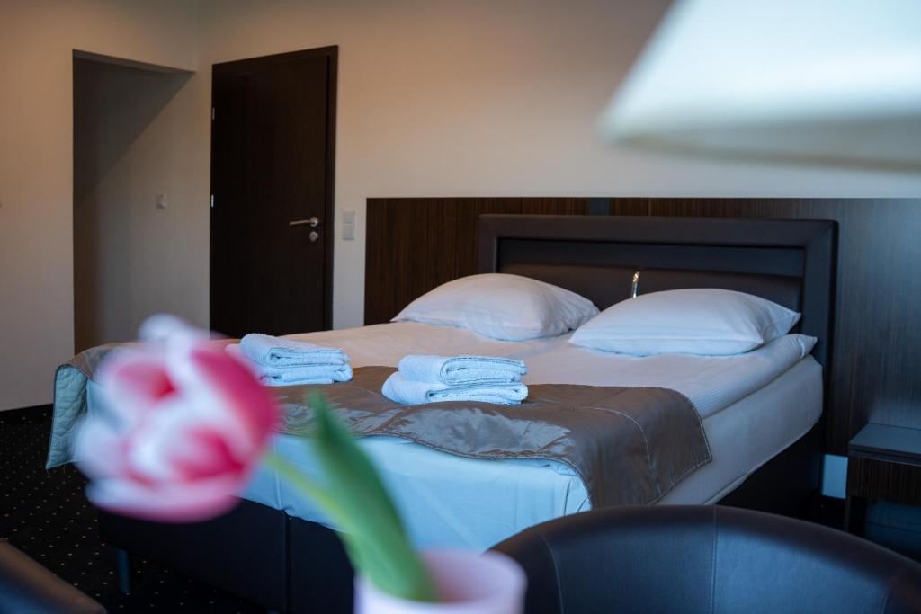 Postel nebo postele na pokoji v ubytování Aparthotel Strefa Premium