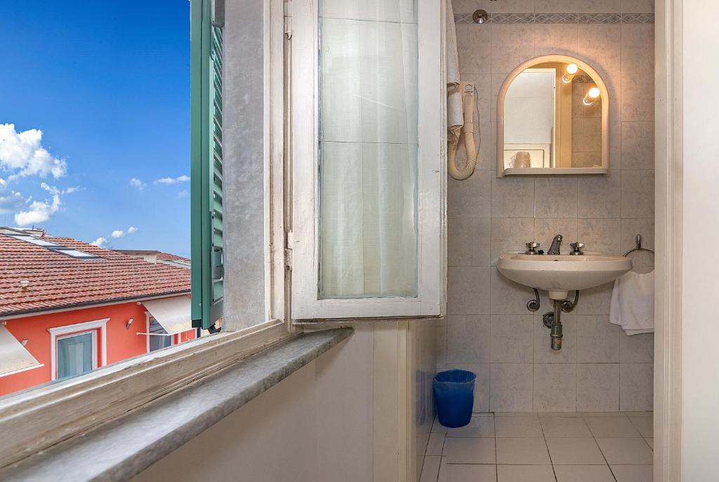 Koupelna v ubytování Hotel Rex