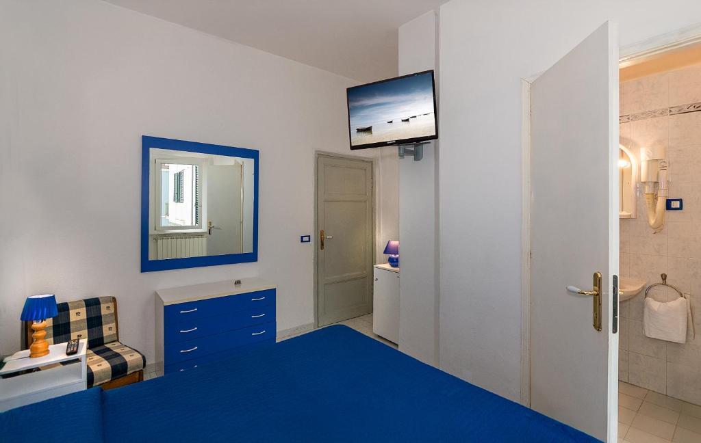 TV a/nebo společenská místnost v ubytování Hotel Rex