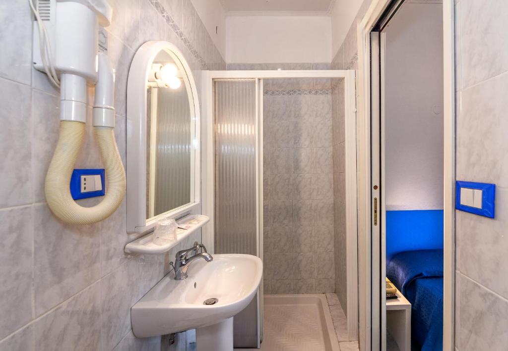 Koupelna v ubytování Hotel Rex