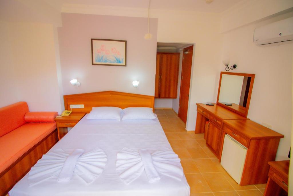 Postel nebo postele na pokoji v ubytování Celeste Hotel