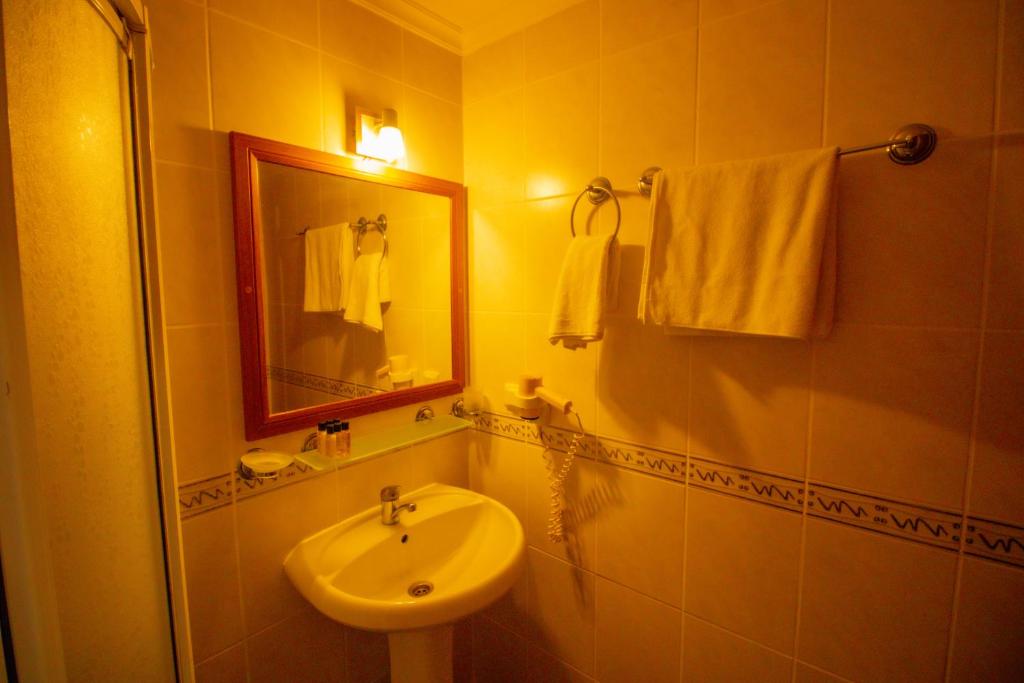 Koupelna v ubytování Celeste Hotel