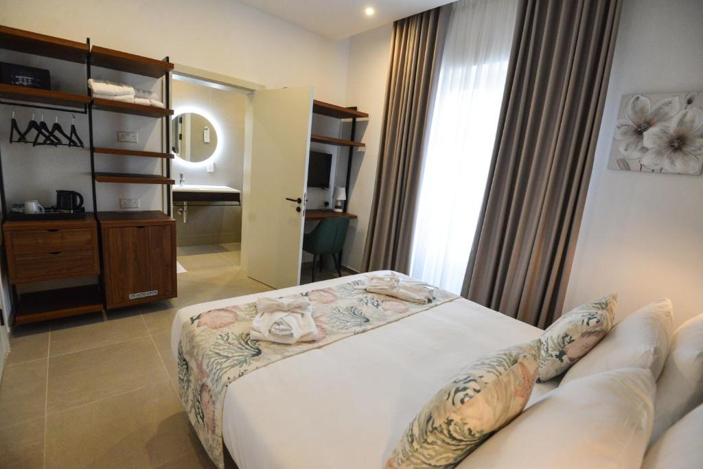 Postel nebo postele na pokoji v ubytování Aqueduct Boutique B&B