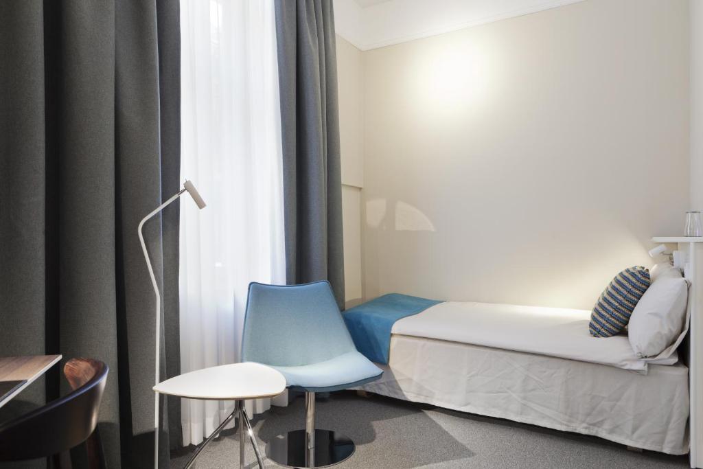 Postel nebo postele na pokoji v ubytování Hotel Örebro