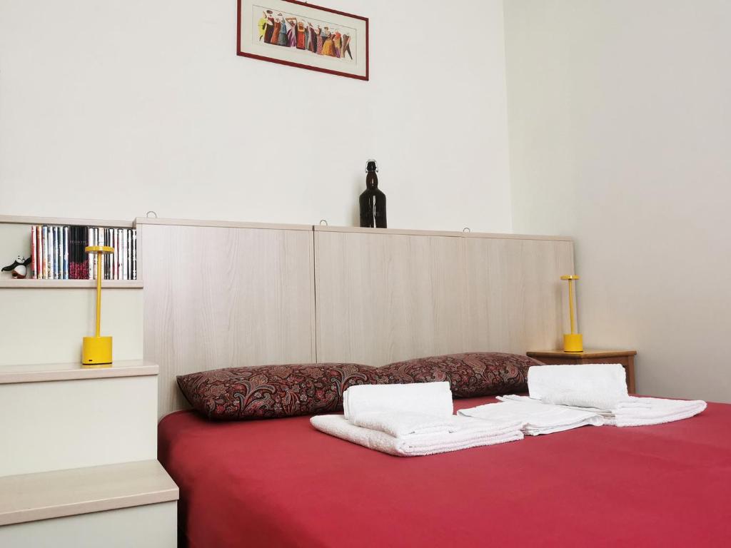 Postel nebo postele na pokoji v ubytování B&B Le Noci