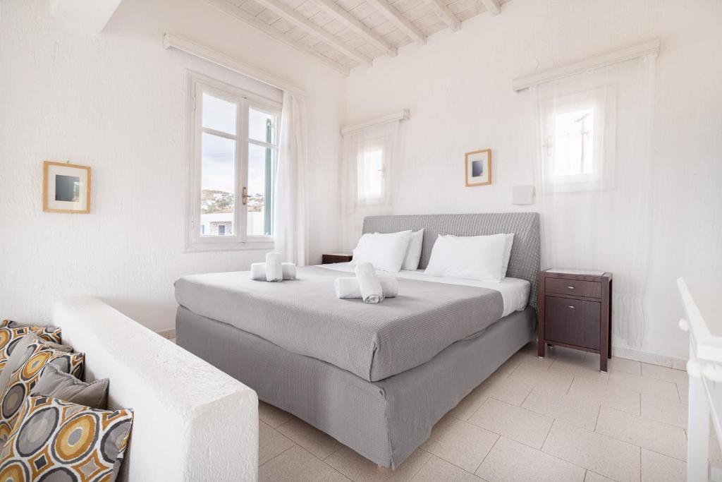 Postel nebo postele na pokoji v ubytování Fos Apartments Mykonos