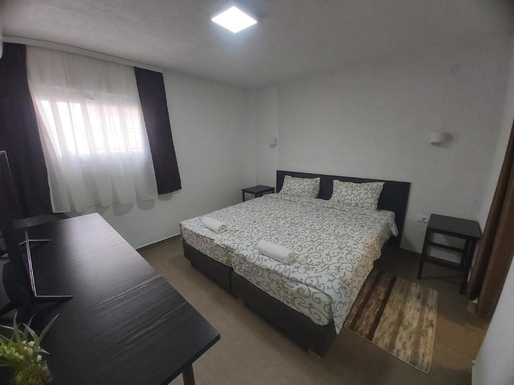 Postel nebo postele na pokoji v ubytování Vila Kruna