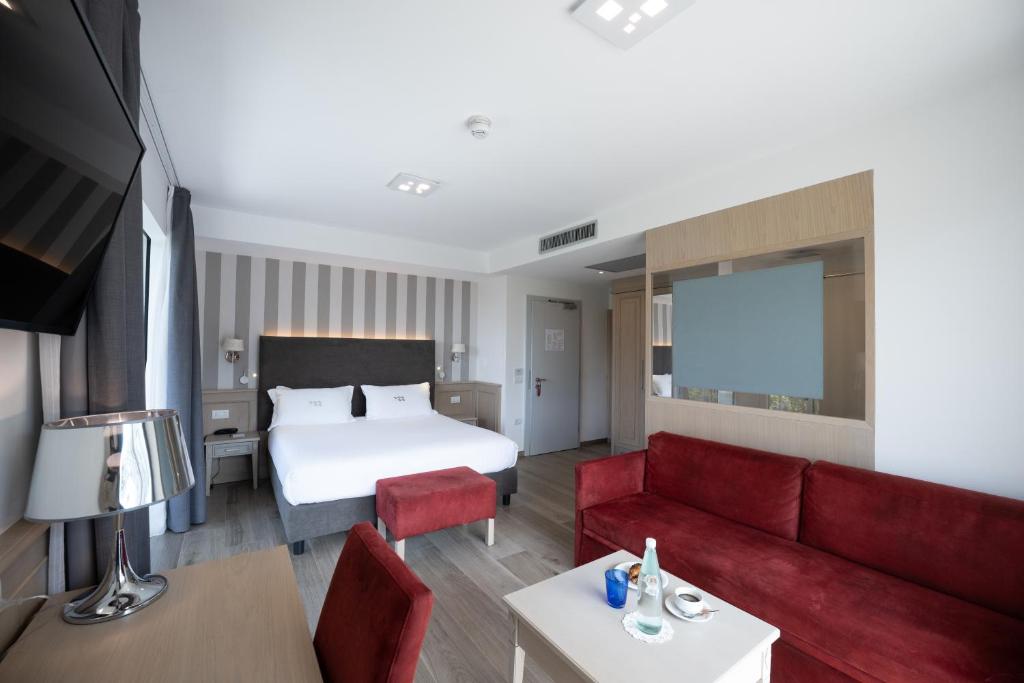 Postel nebo postele na pokoji v ubytování Hotel Bellariva
