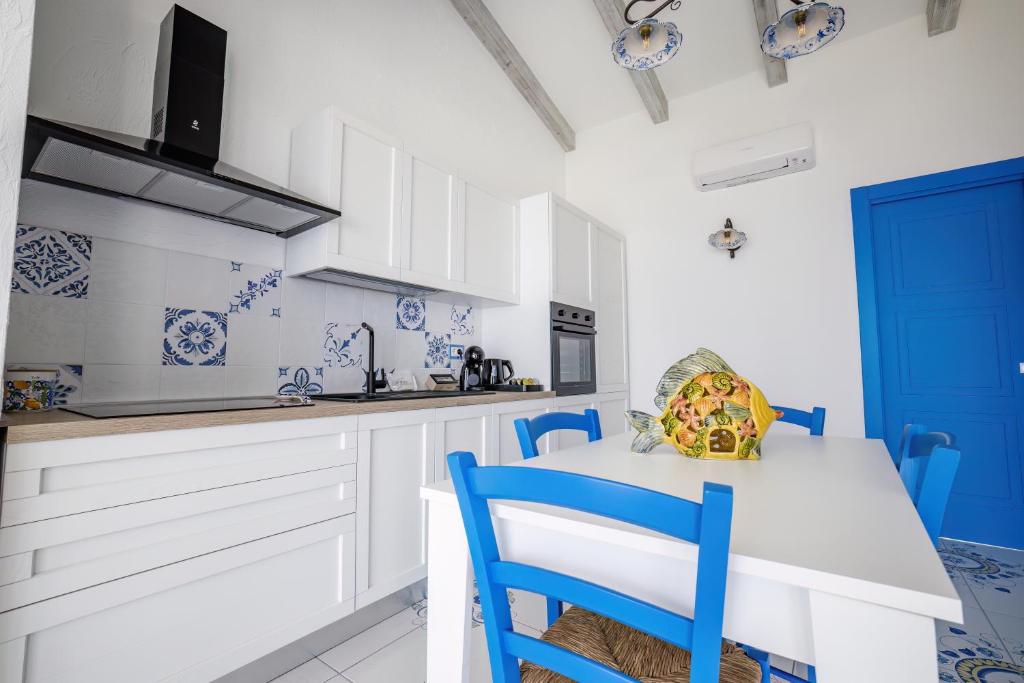 Kuchyň nebo kuchyňský kout v ubytování Étoiles Guest House