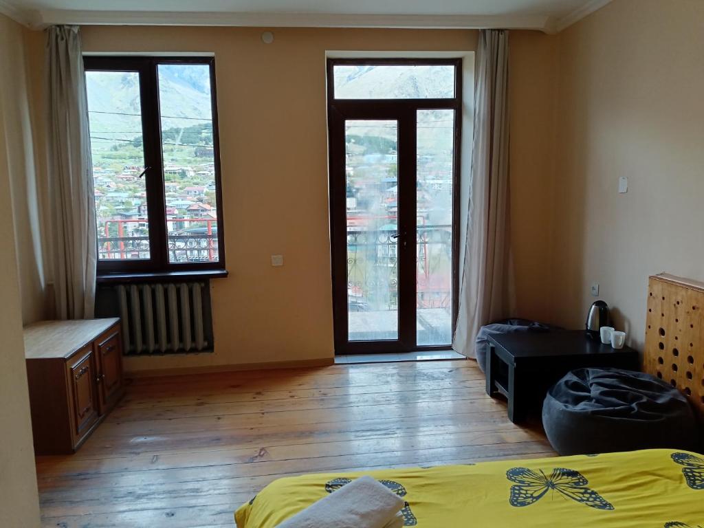 Voodi või voodid majutusasutuse Belas guesthouse toas