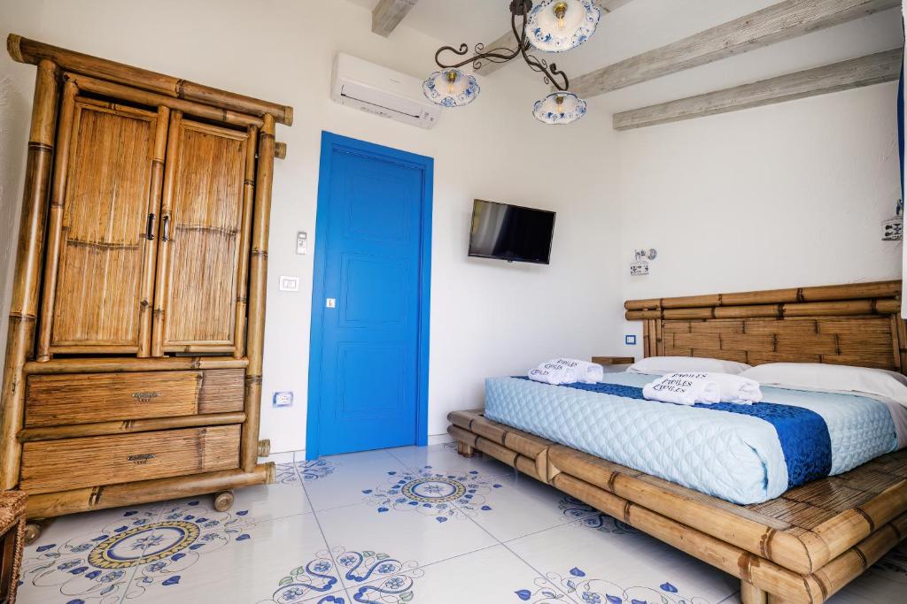 Postel nebo postele na pokoji v ubytování Étoiles Guest House