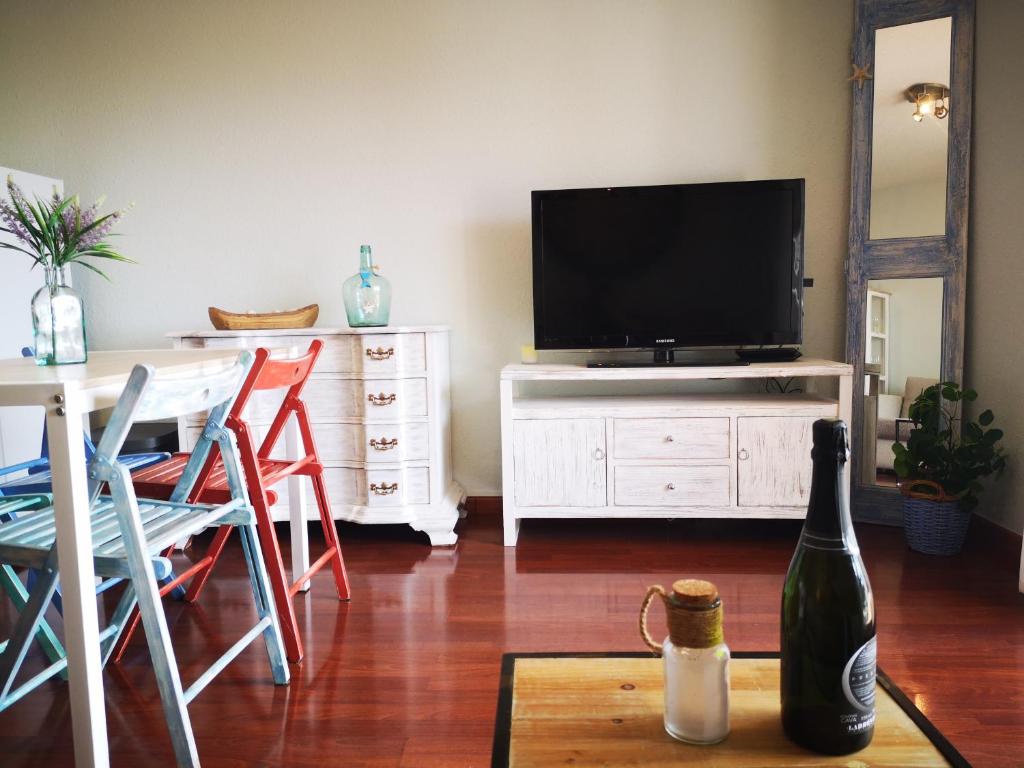 TV a/nebo společenská místnost v ubytování Apartamentos 62 Peñiscola