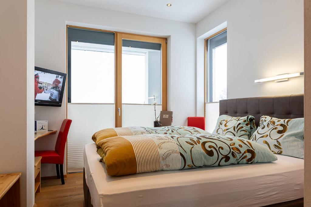 Voodi või voodid majutusasutuse Aparthotel DAS Hochkönig toas
