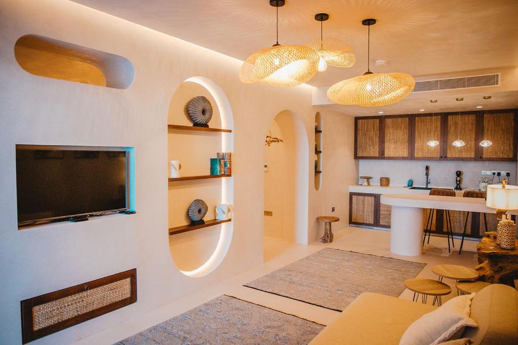 Kuchyň nebo kuchyňský kout v ubytování Q Coconuts Seaside Suites