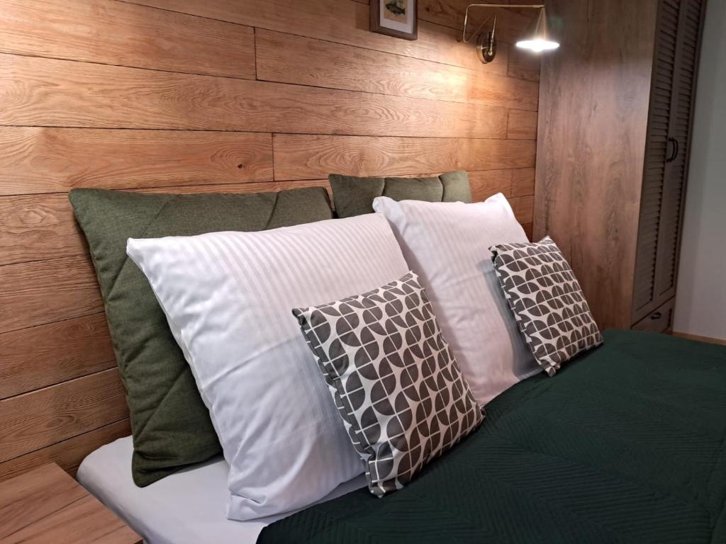 Postel nebo postele na pokoji v ubytování DK Apartamenty Hotelove
