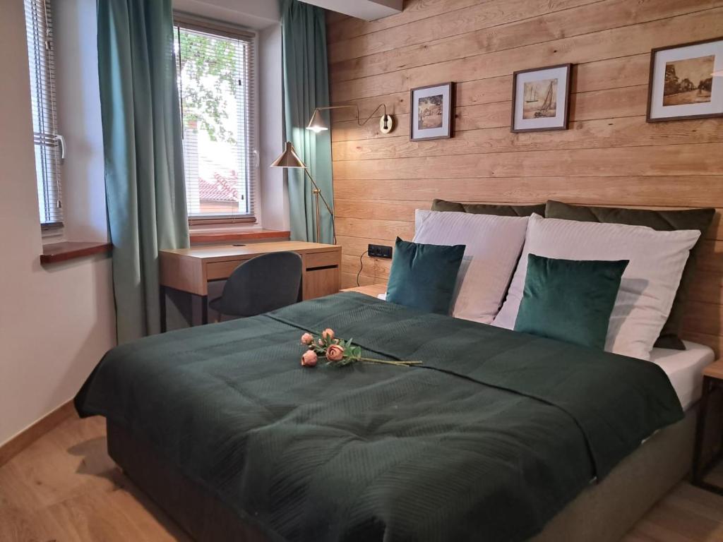 Postel nebo postele na pokoji v ubytování DK Apartamenty Hotelove