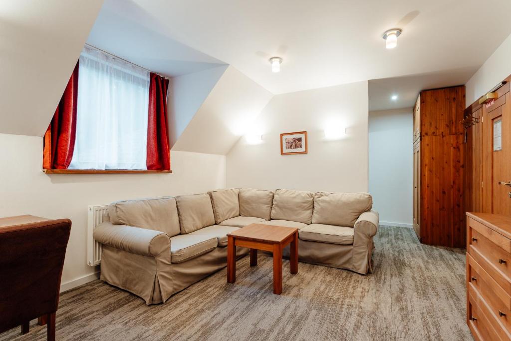 Posezení v ubytování Hotel Mikulášska Chata