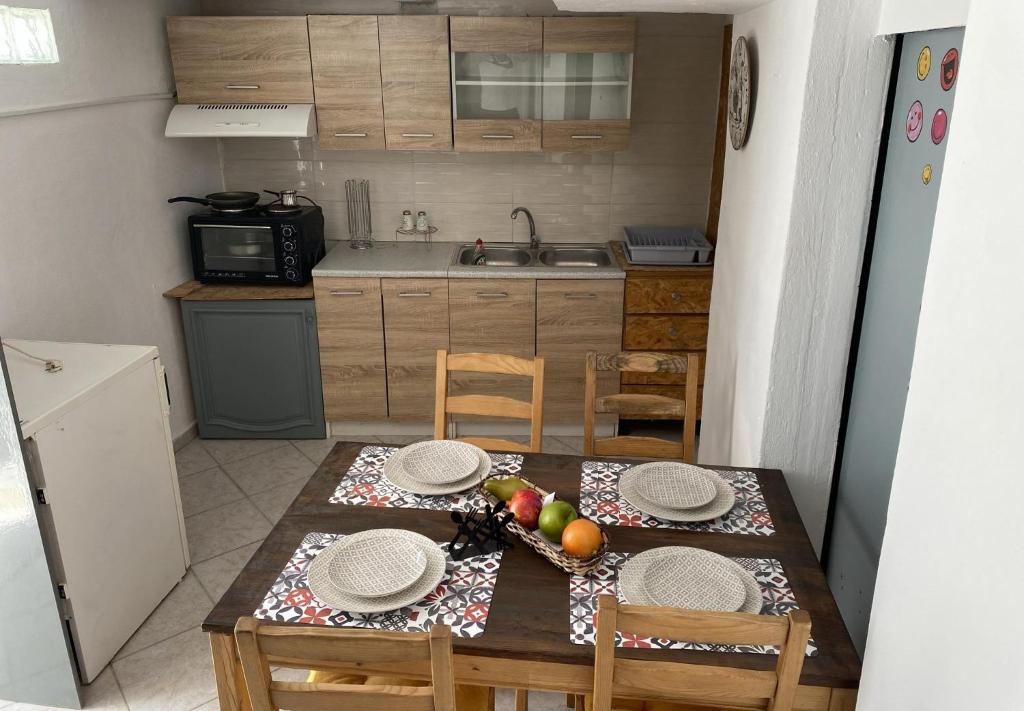 Kuchyň nebo kuchyňský kout v ubytování Popi's Apartment