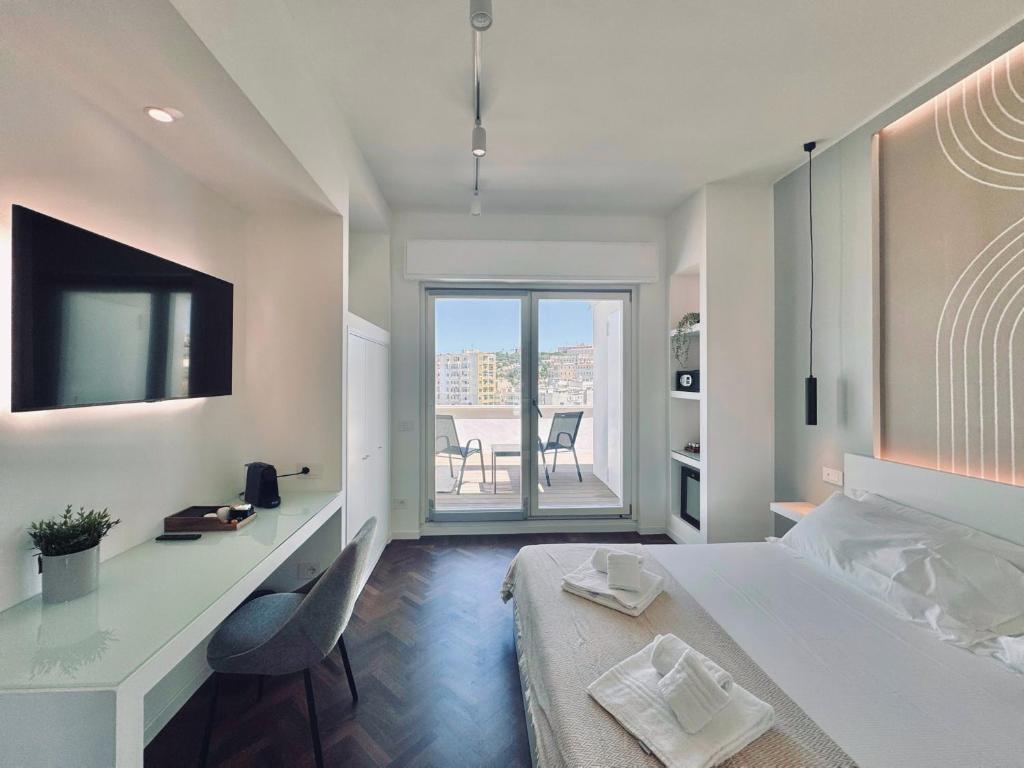 Postel nebo postele na pokoji v ubytování Mameli View Cagliari